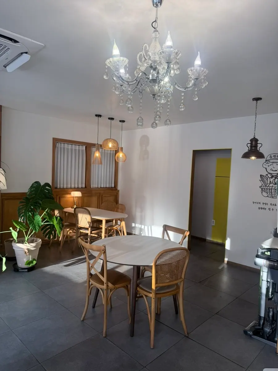 Seating with rattan chairs and wooden tables