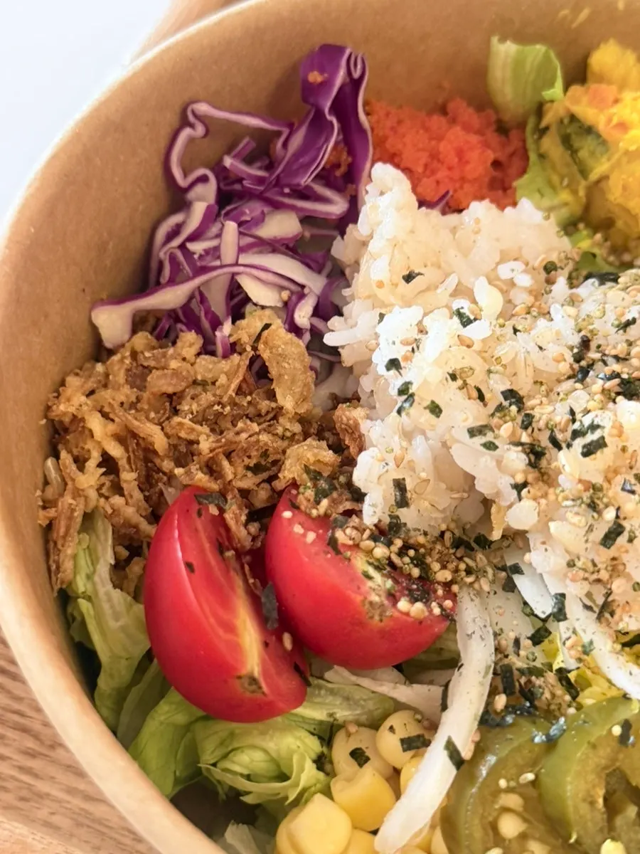 Poke mixed with grain rice and vegetables