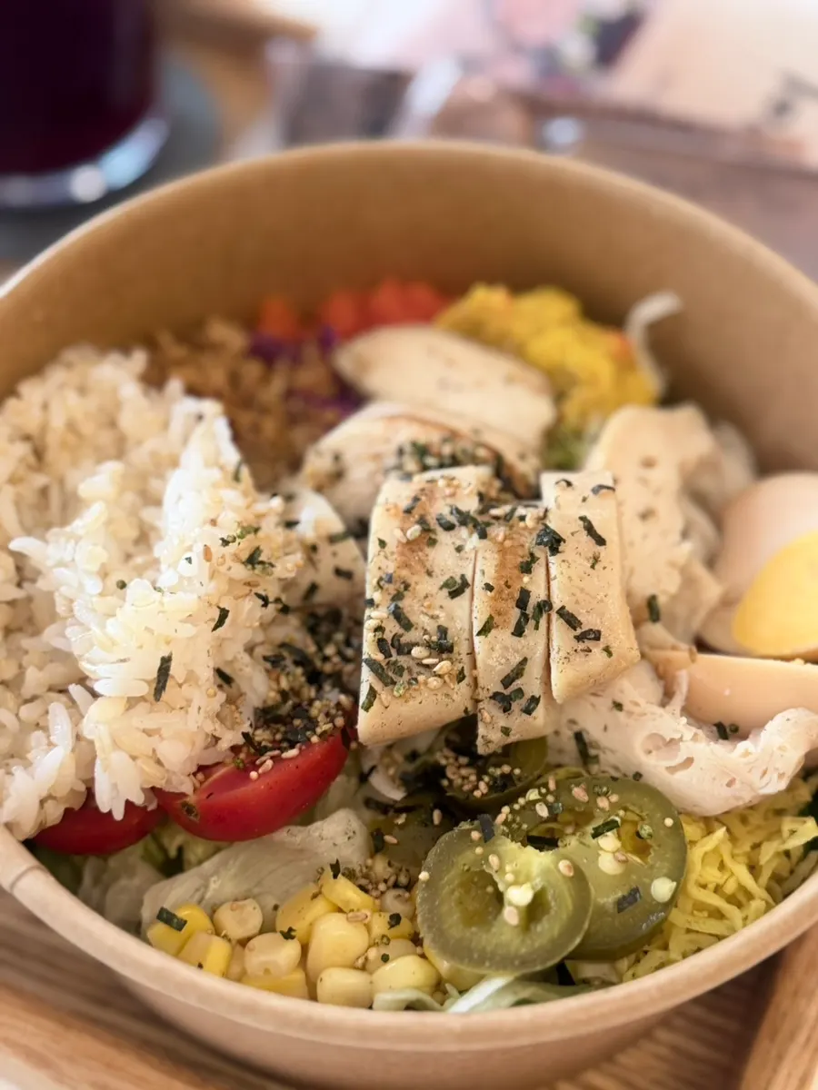 Poke bowl topped with chicken breast