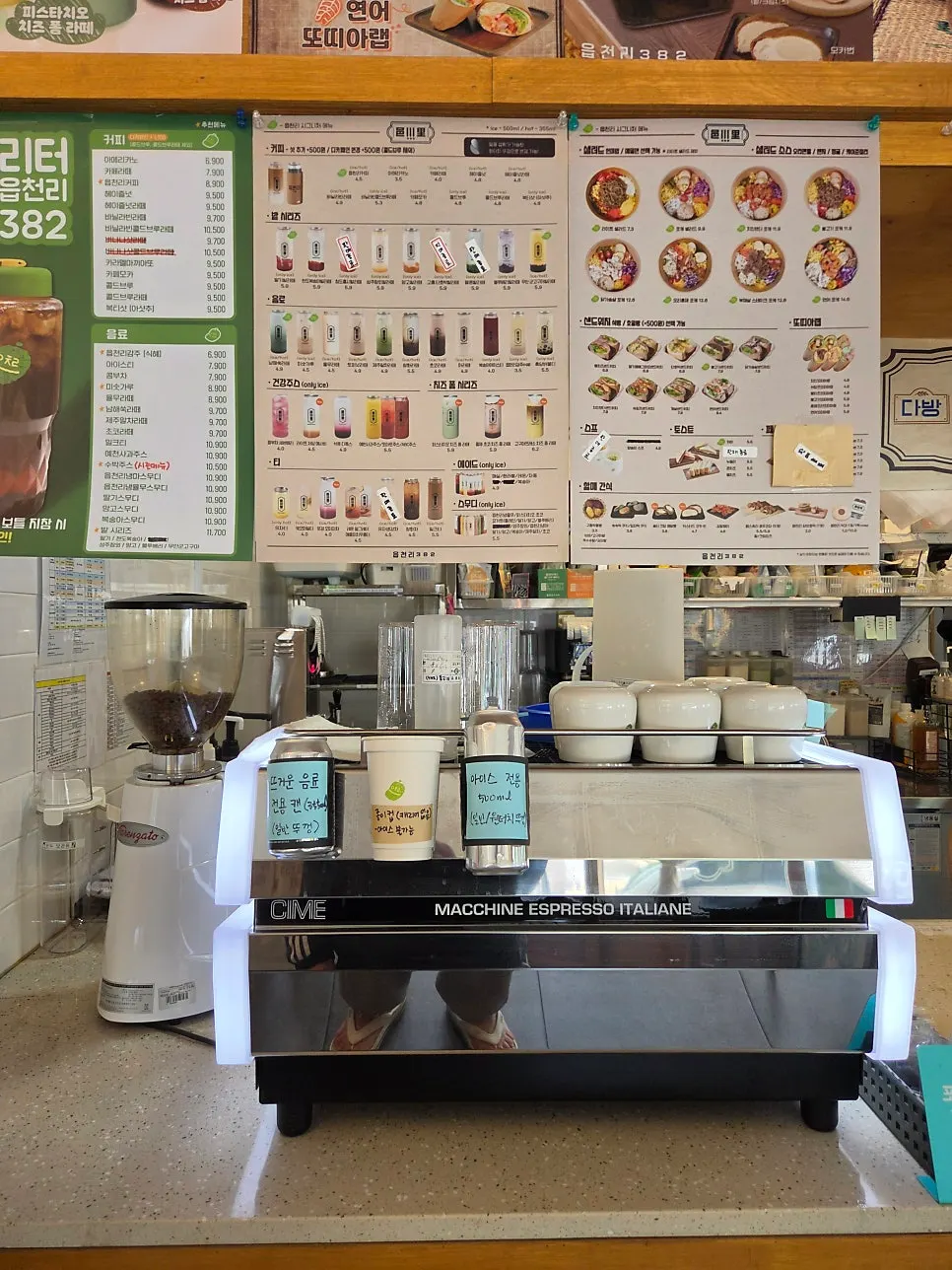 Menu board listing coffee to poke