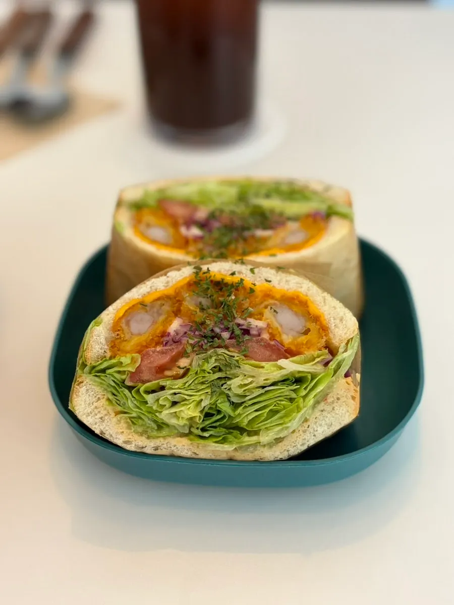 Cross-section of a shrimp sandwich stuffed with filling