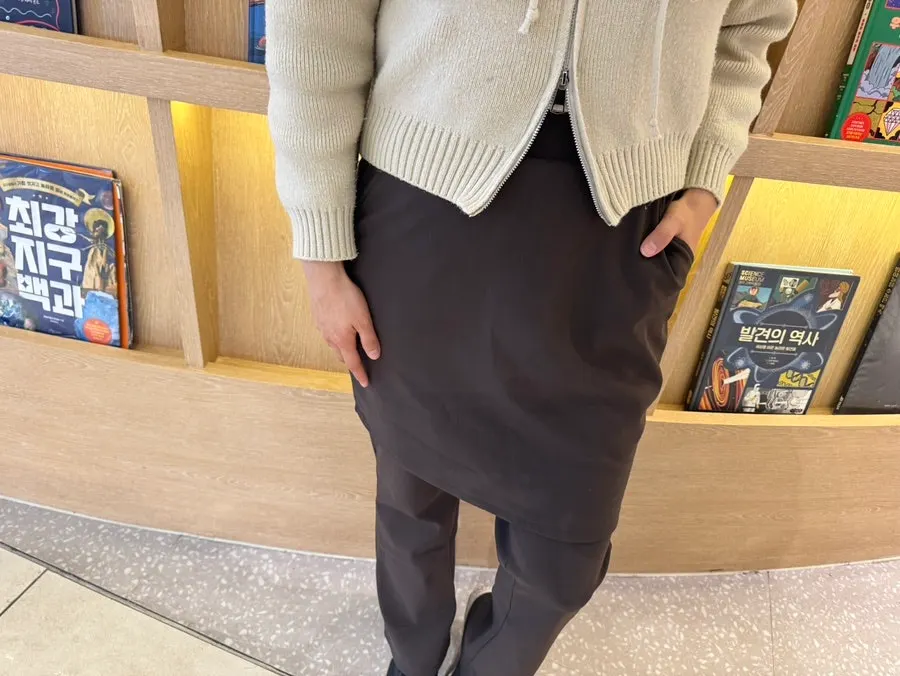 Fleece-lined skirt-layered pants styled with a shirt