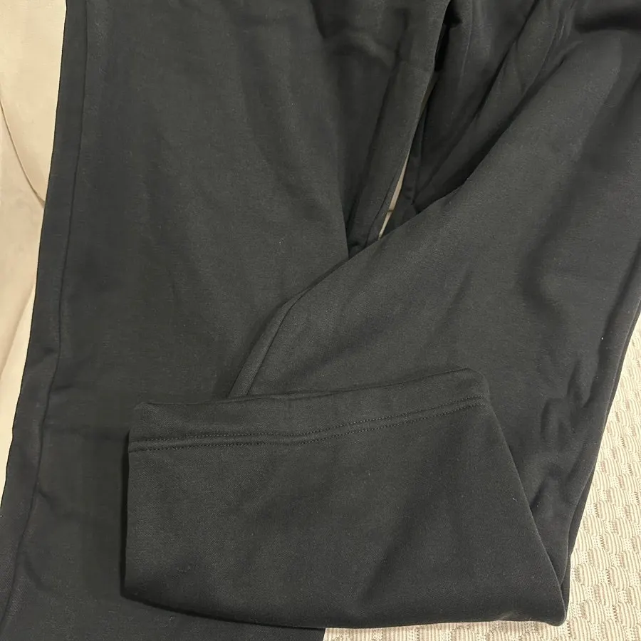 Black jogger pants with an elastic waistband