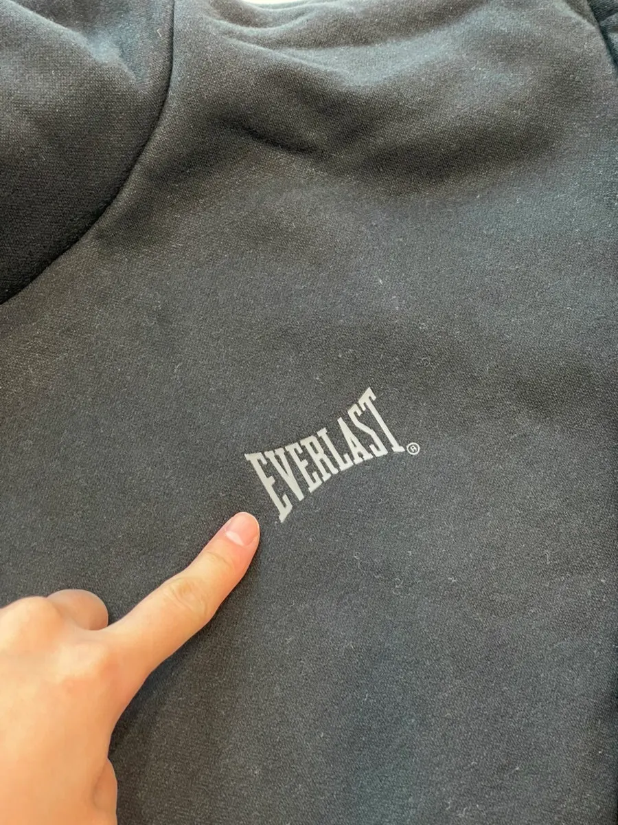 Small logo on the front of the hoodie