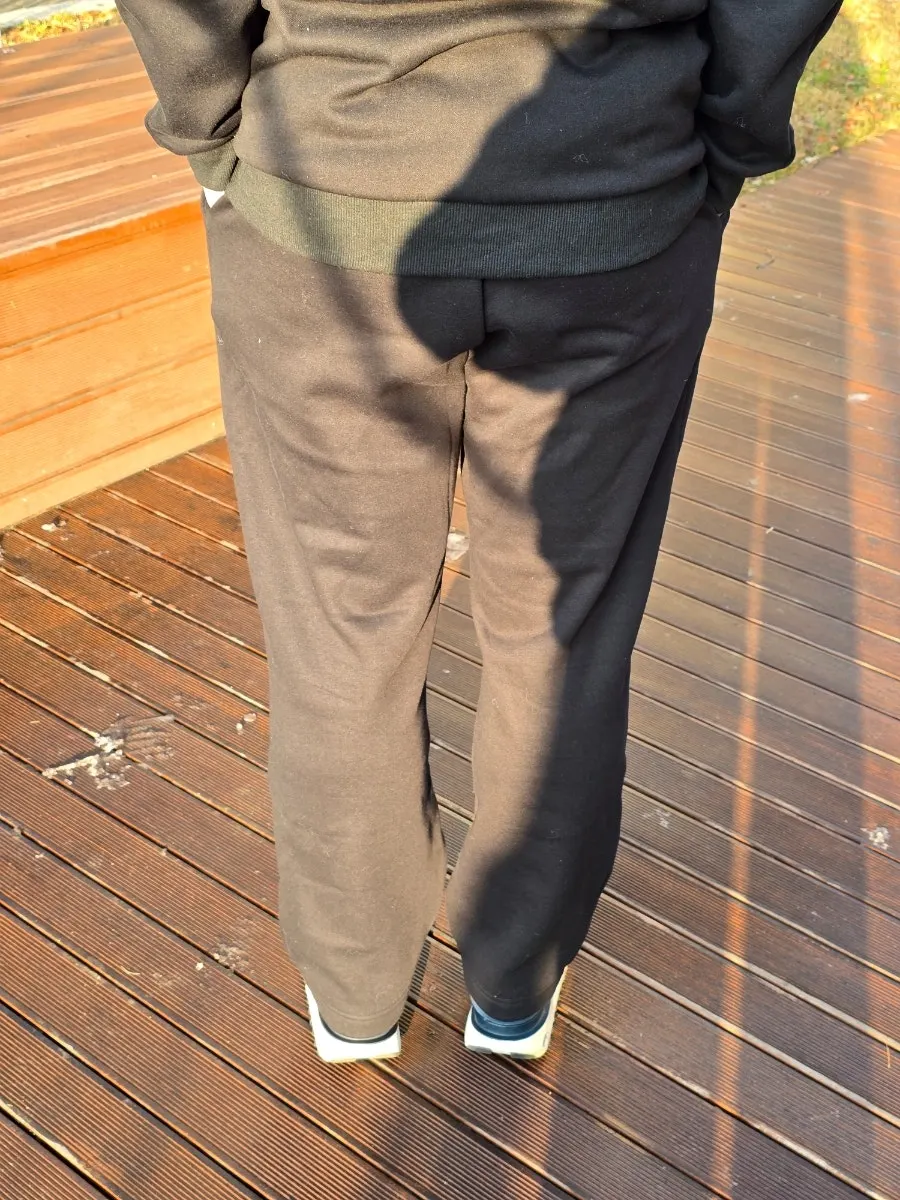 Wearing a hoodie and straight-leg pants set