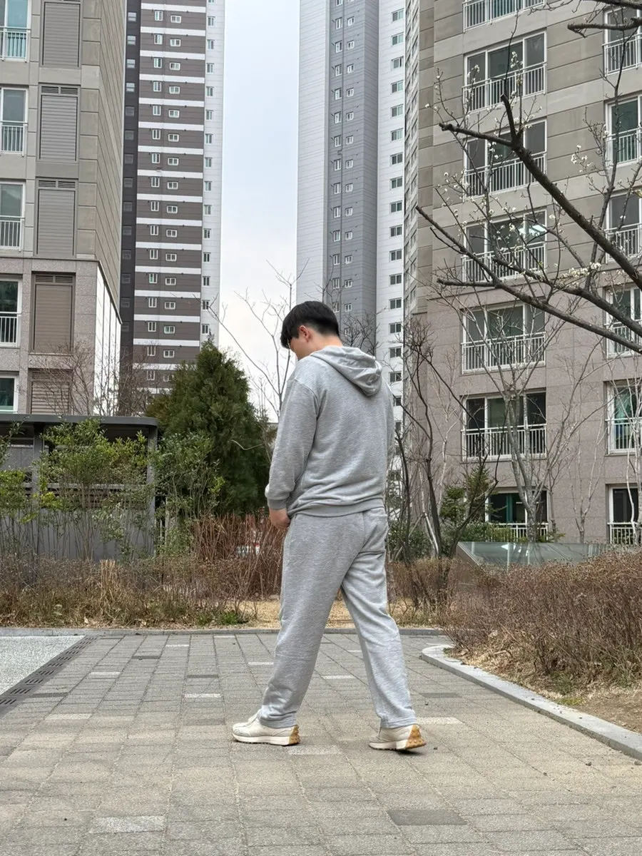 Gray tracksuit layered on a chilly day