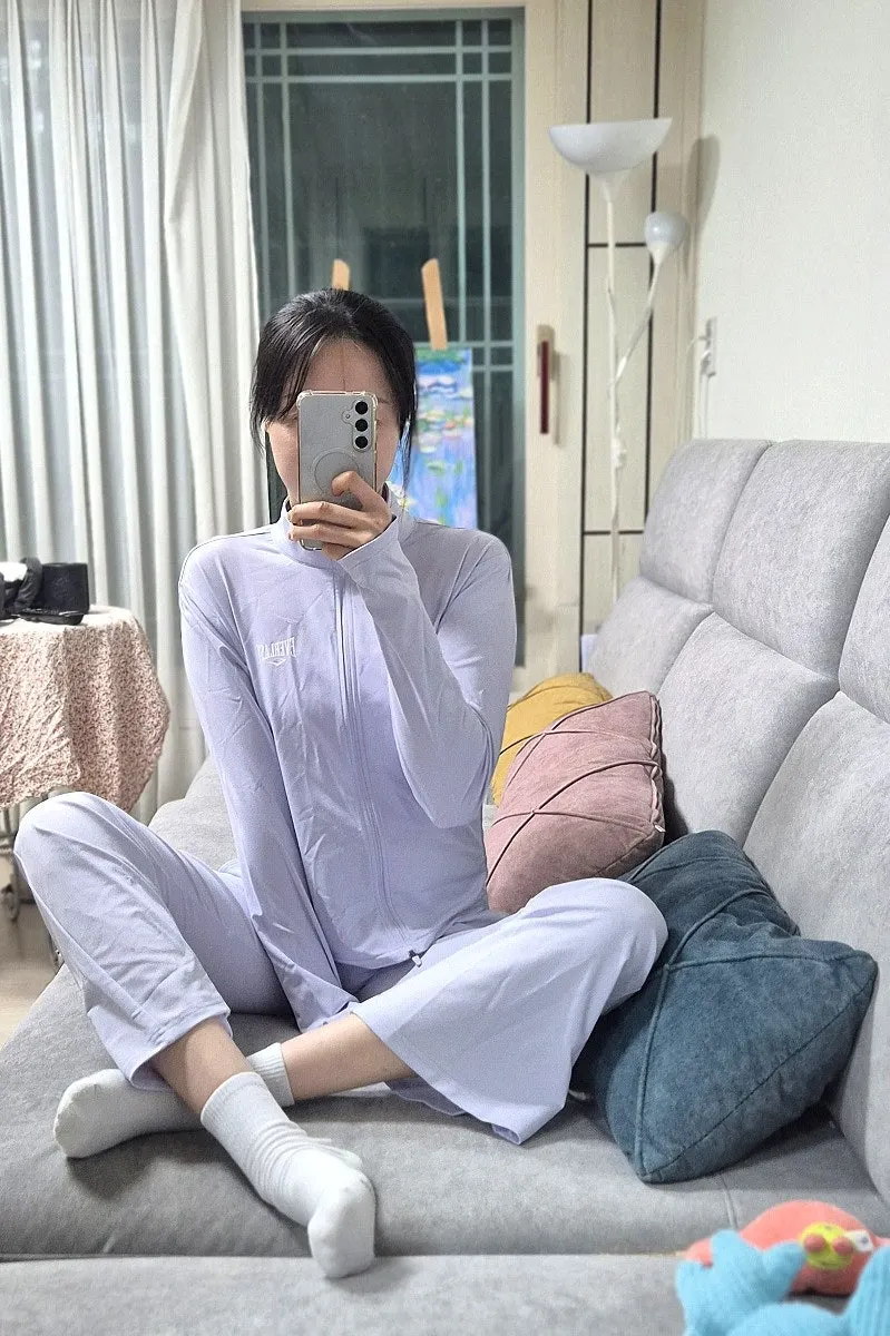 Wearing the running jacket and bootcut pants together
