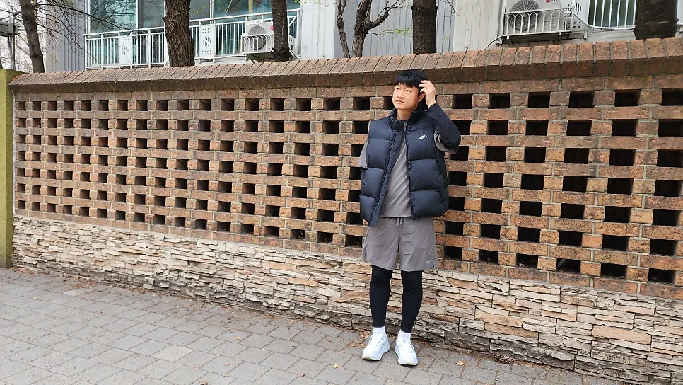 Wearing khaki gray layered running wear