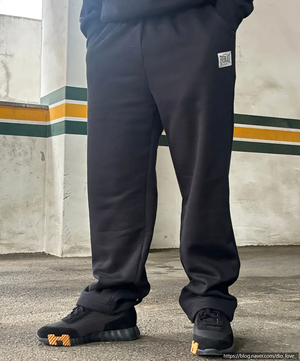 Wearing the black fleece-lined tracksuit set