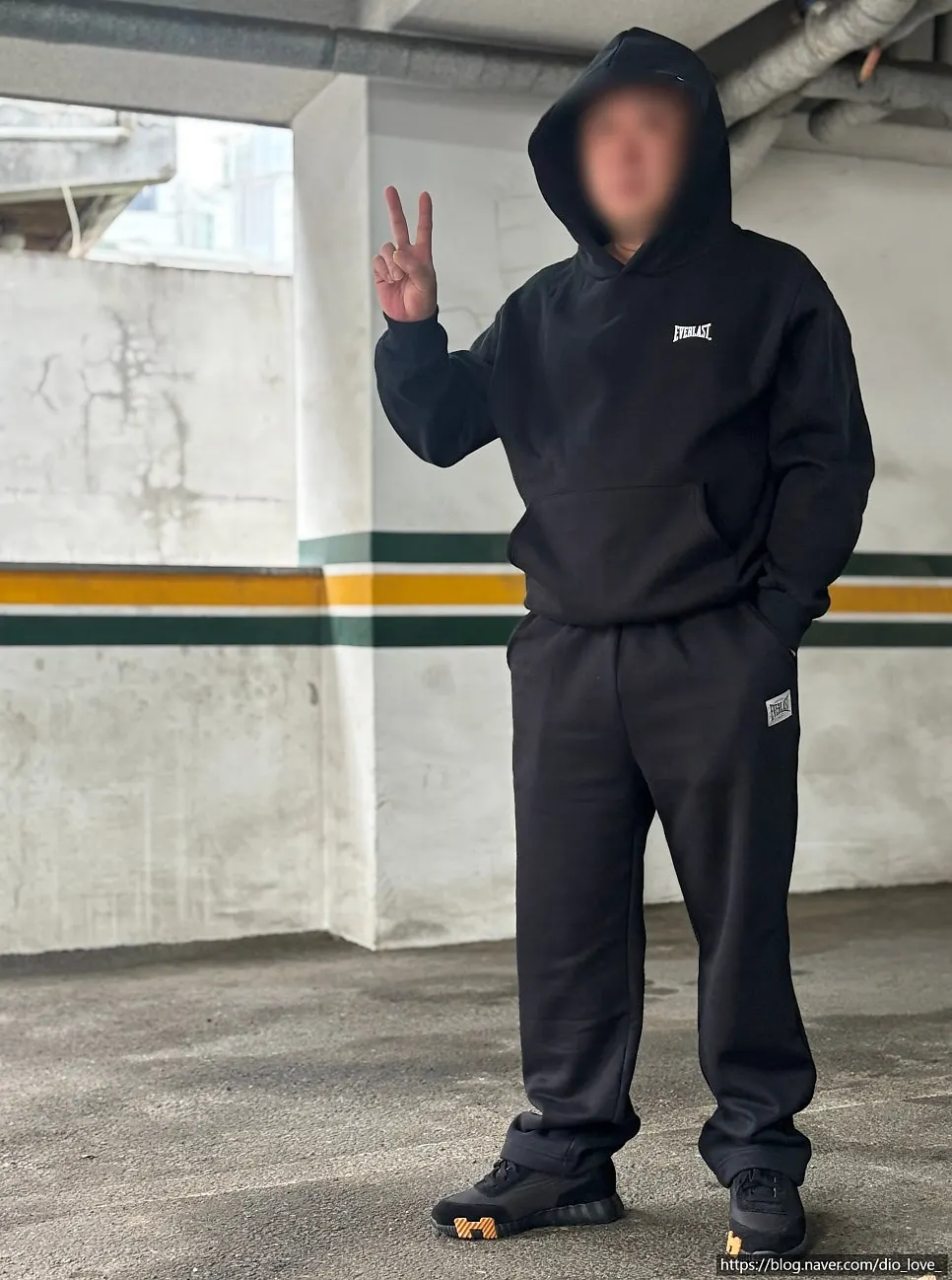 Wearing the kangaroo-pocket hoodie on its own