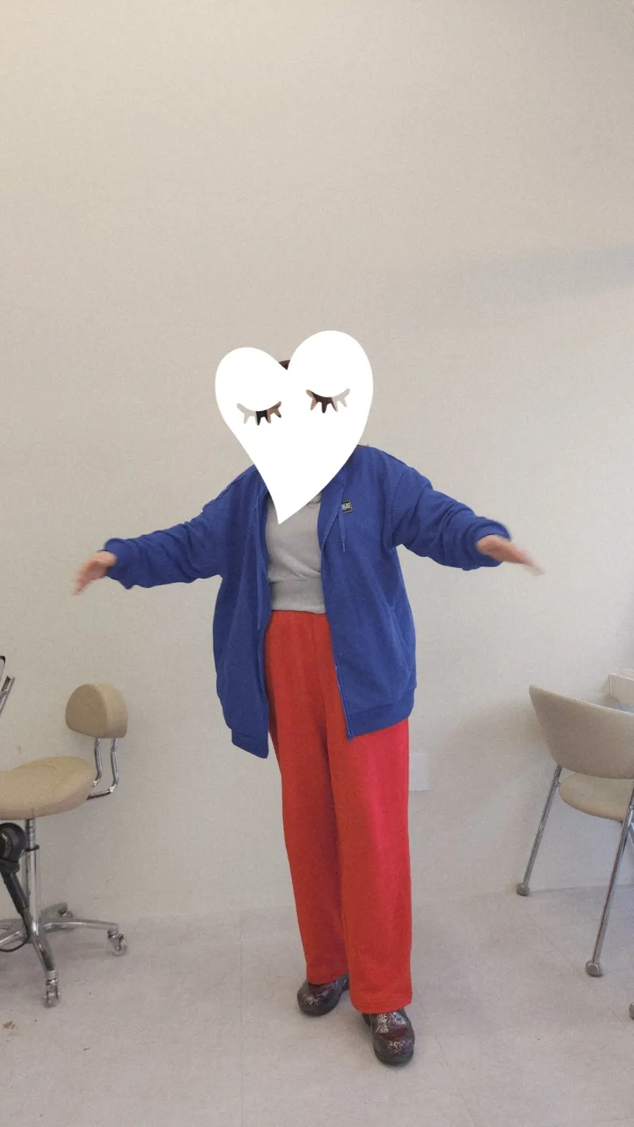 Blue full-zip hoodie and red straight-leg pants outfit