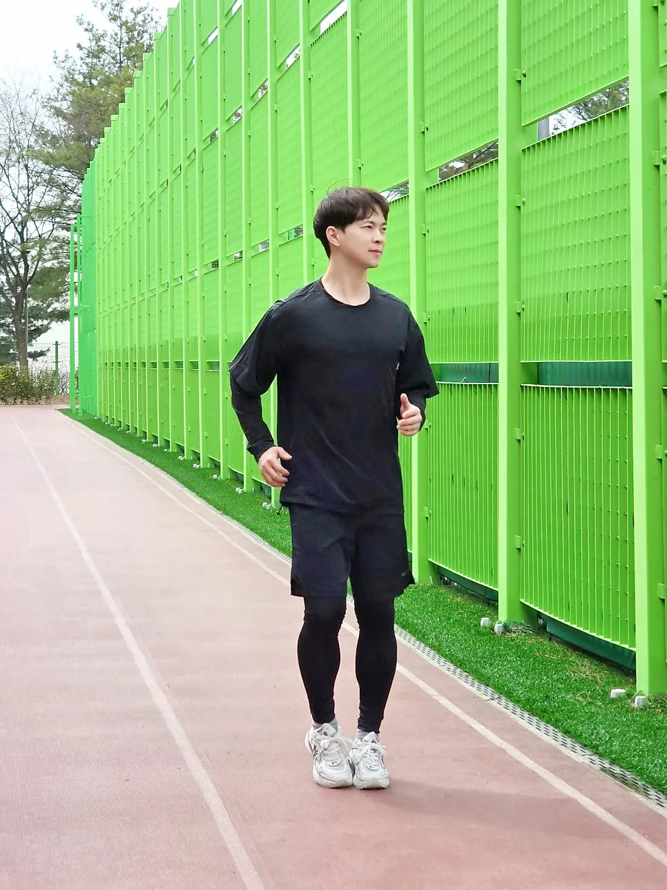Black running outfit set with a roomy fit