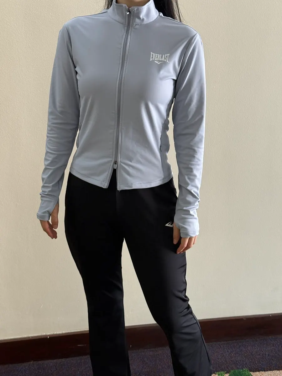 Everlast running jacket and bootcut pants worn together