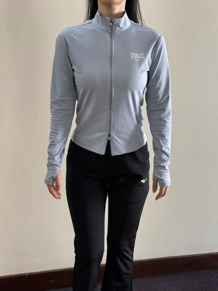 Worn silhouette of the slim-fit running jacket and bootcut pants