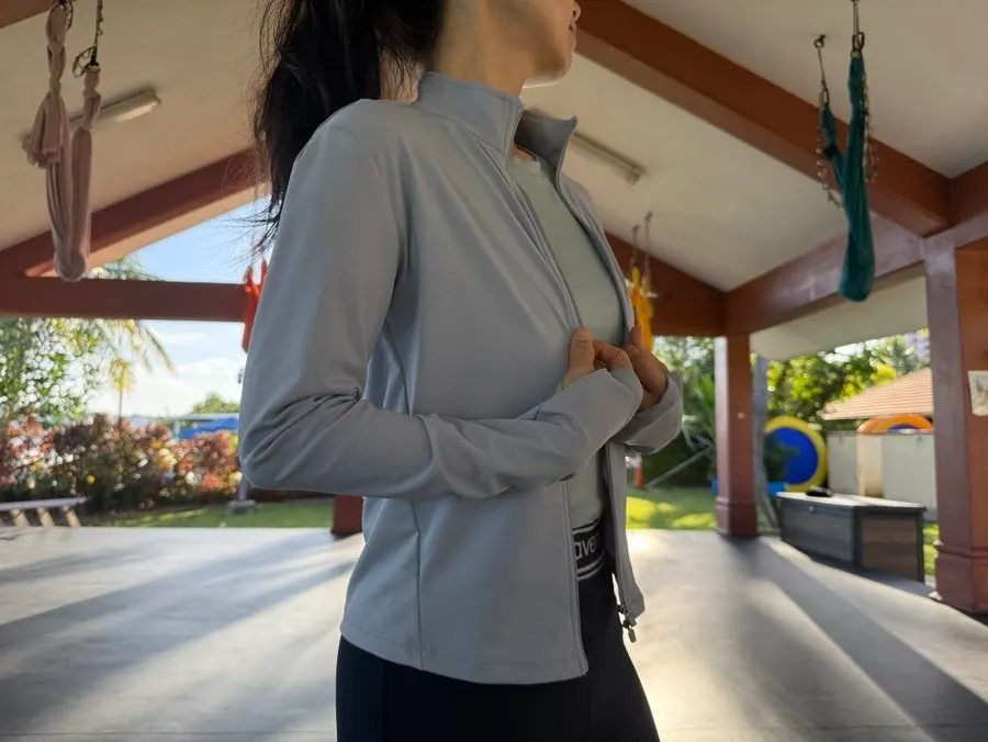 Running jacket and bootcut pants chosen as a yoga outfit
