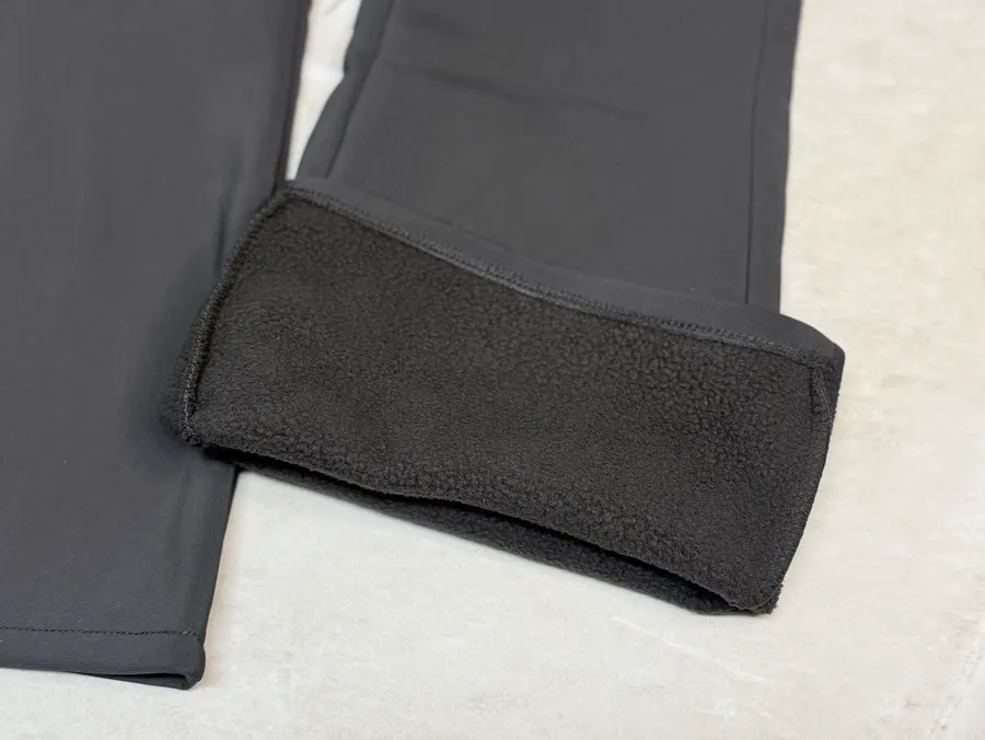 Fleece pants worn outdoors on a cold day