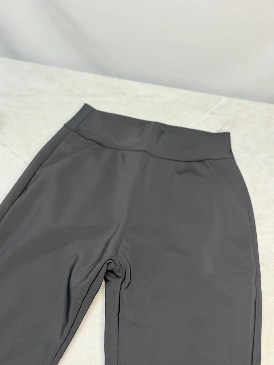 Bootcut pants showing their stretch during movement