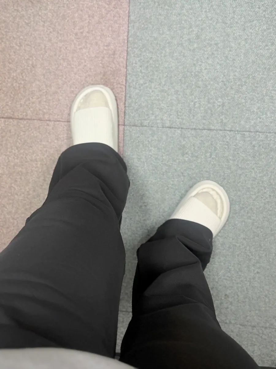 Bootcut fleece pants styled with winter outerwear