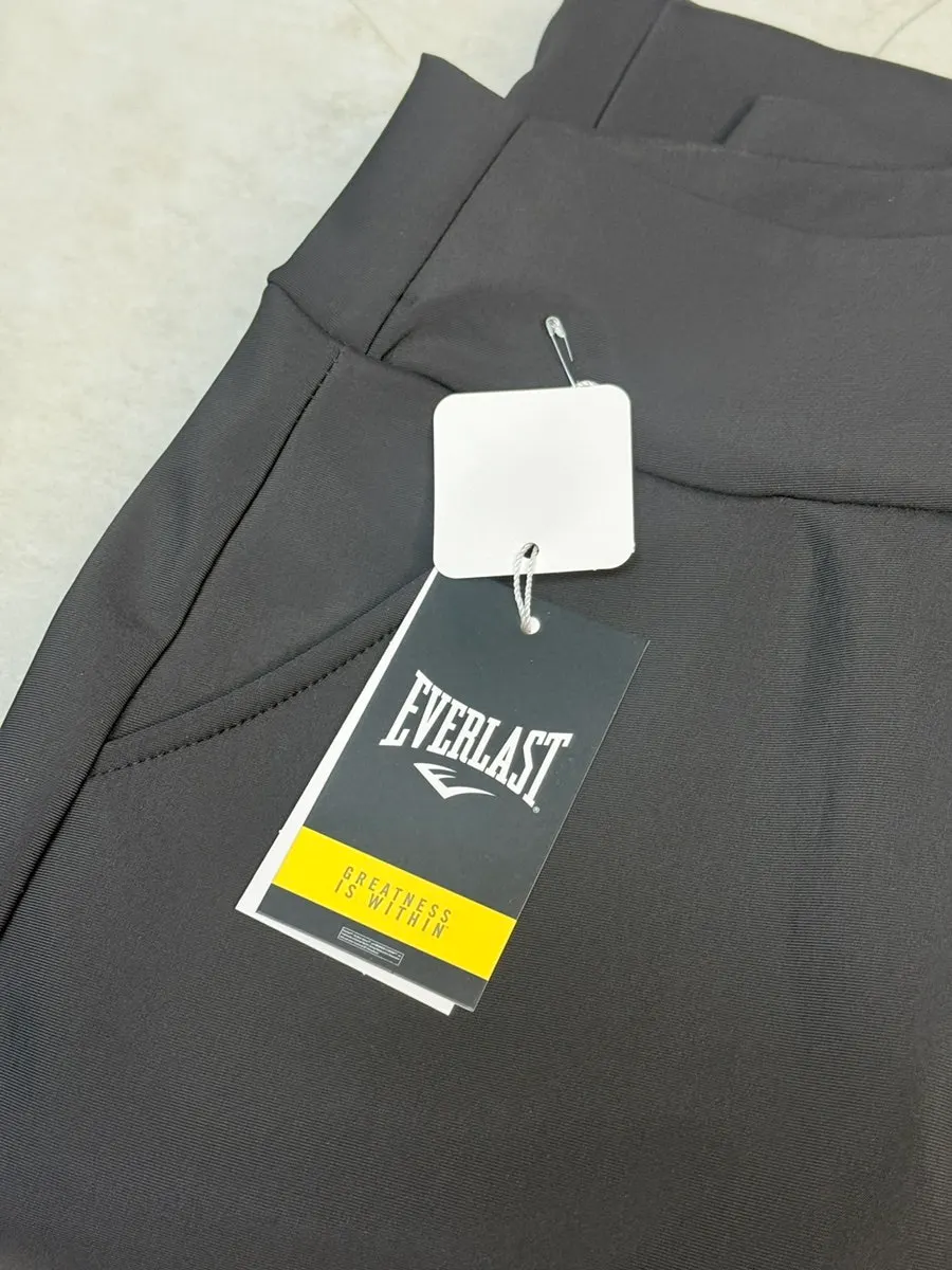 Black bootcut pants worn in everyday life