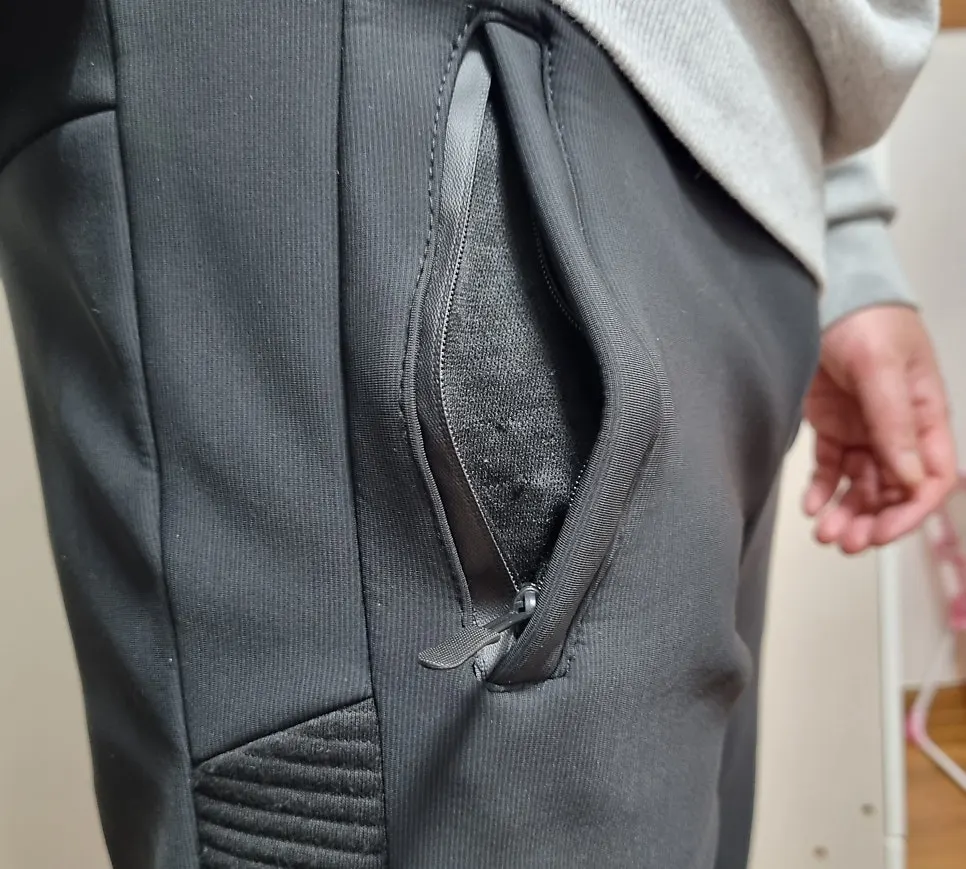 Fleece-lined pants zip-pocket detail
