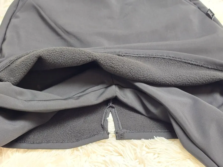 Black bootcut skort pants in a winter outfit