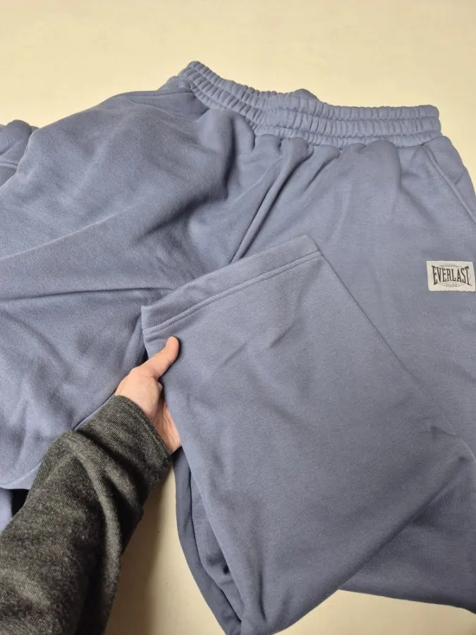 Wearing roomy straight-leg pants