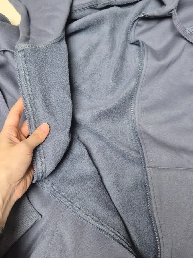 Fleece-lined tracksuit worn as a winter outfit