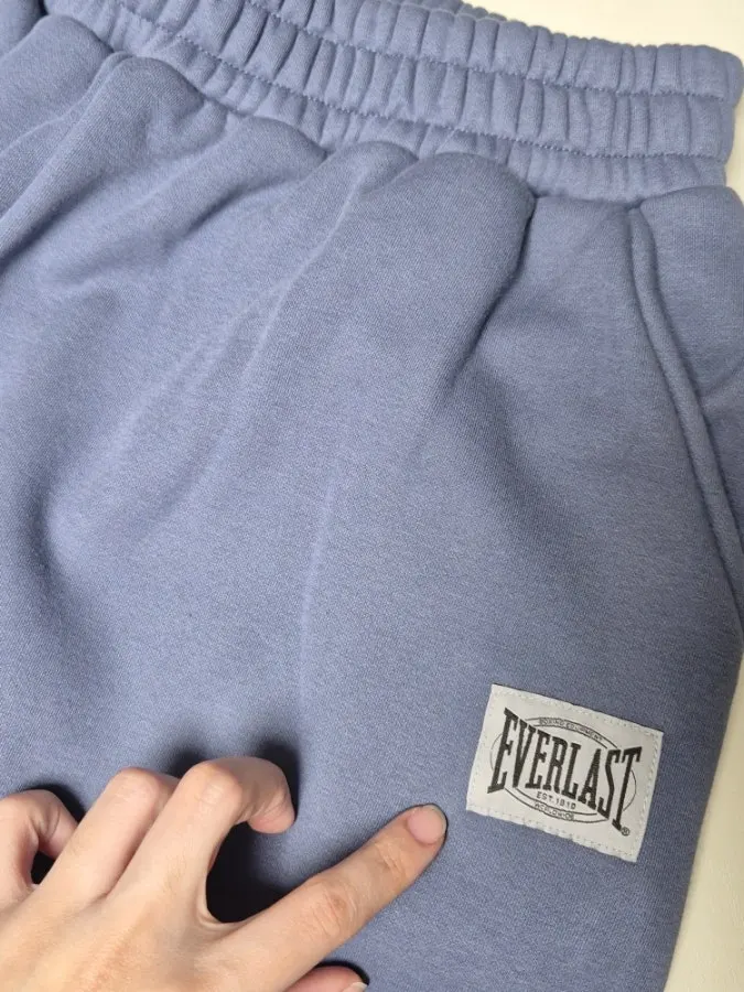 Hooded zip-up and pants in matching colors