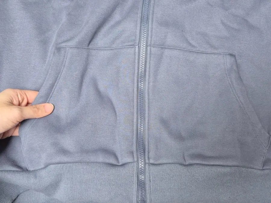 Details of the hooded zip-up and straight-leg pants set