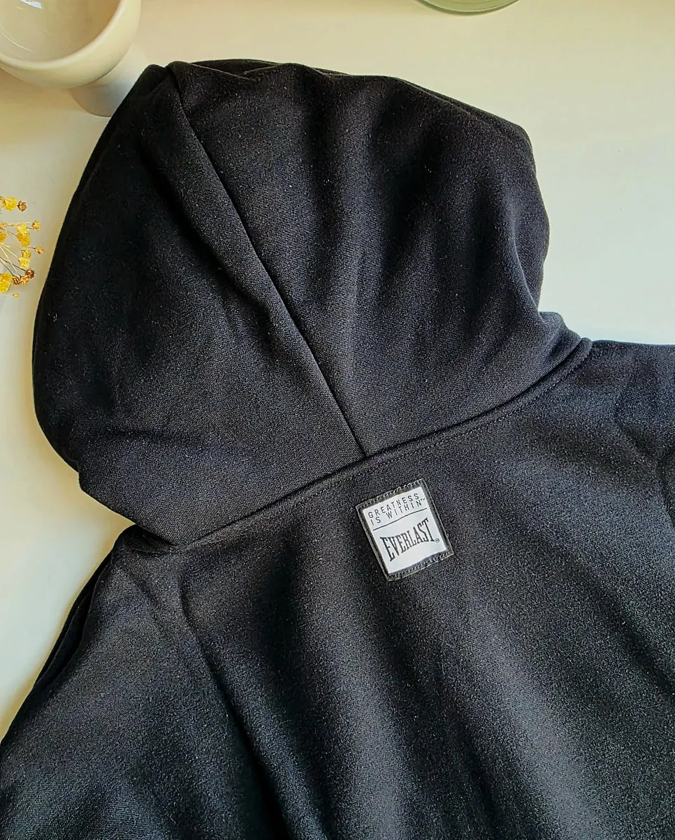 Fleece hoodie zip-up worn with the hood up