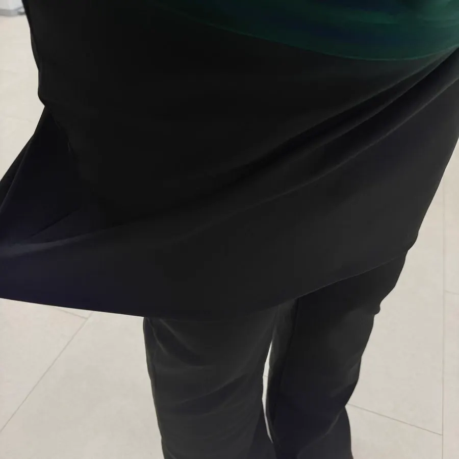 Stretchy fleece-lined skirt pants worn