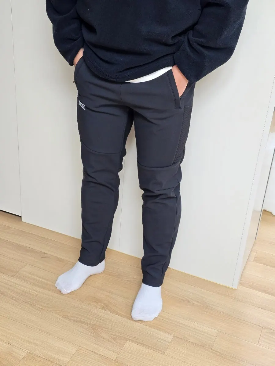 Man wearing workwear-style pants