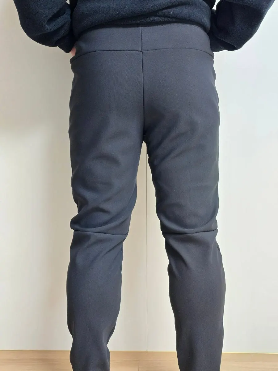 Pants worn with room through the thighs