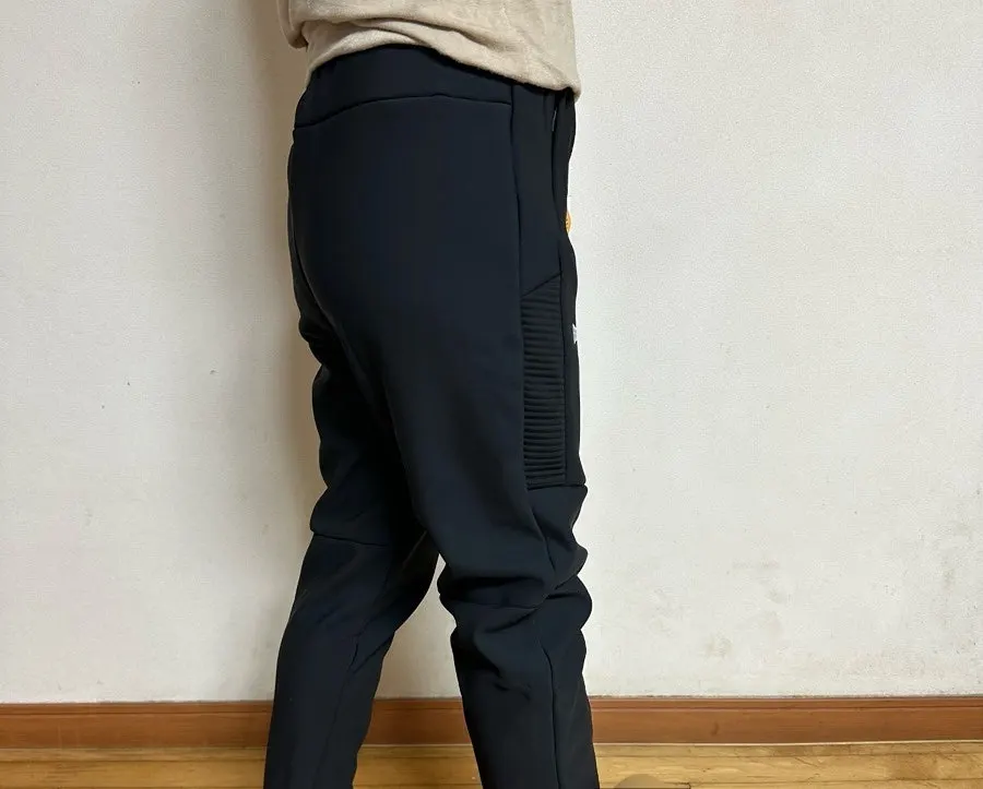 Wearing the fleece-lined pants during outdoor activity