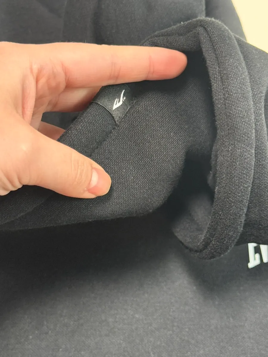 Black training set worn as an everyday outfit