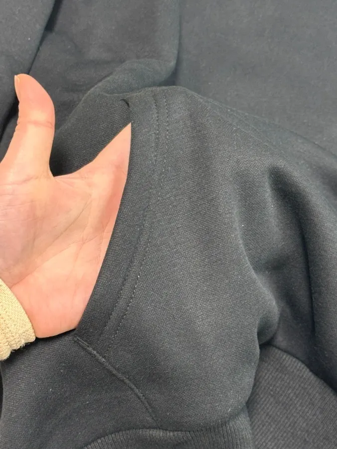 Sleeves and hem finished with ribbed trim