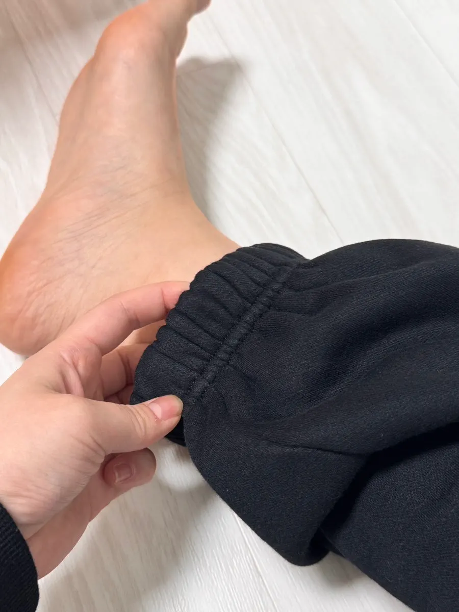 Black fleece-lined training set worn day to day