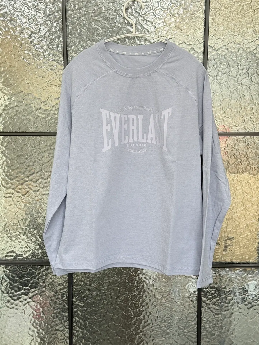 Training set top in a calm pale cobalt color