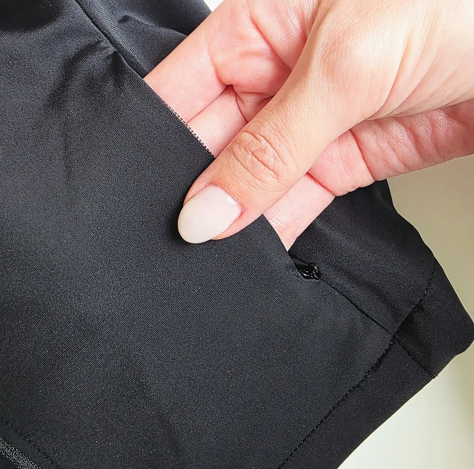 Everlast running jacket worn over a long-sleeve workout top