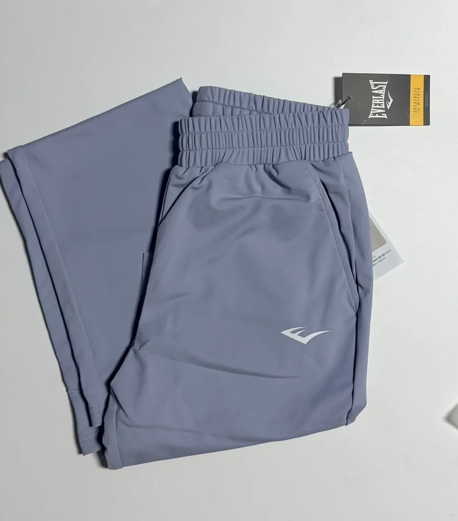 Combination of an Everlast slim-fit jacket and bootcut pants