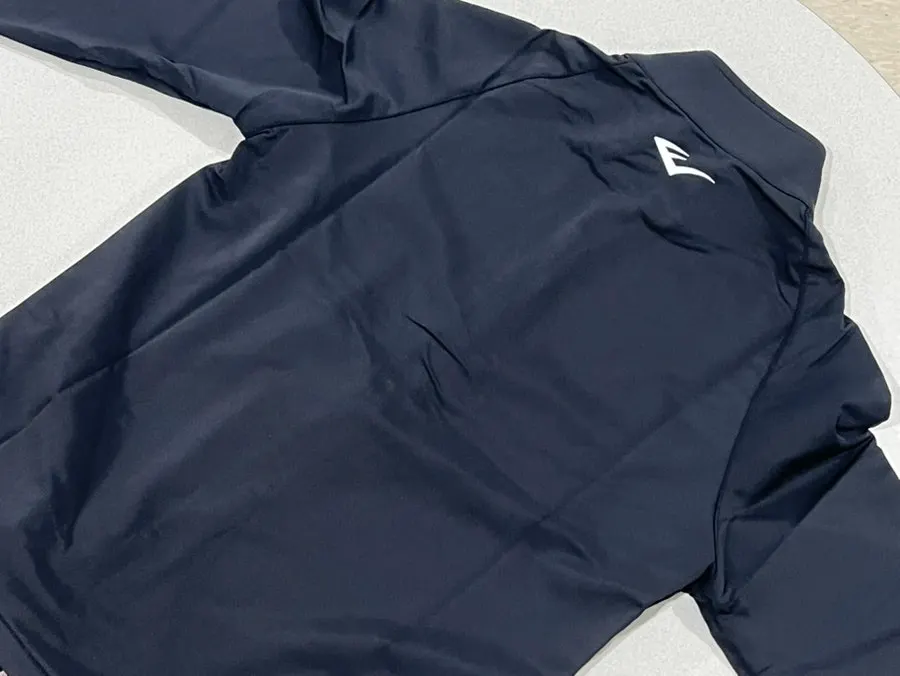 Logo at the back neck of the Everlast running jacket