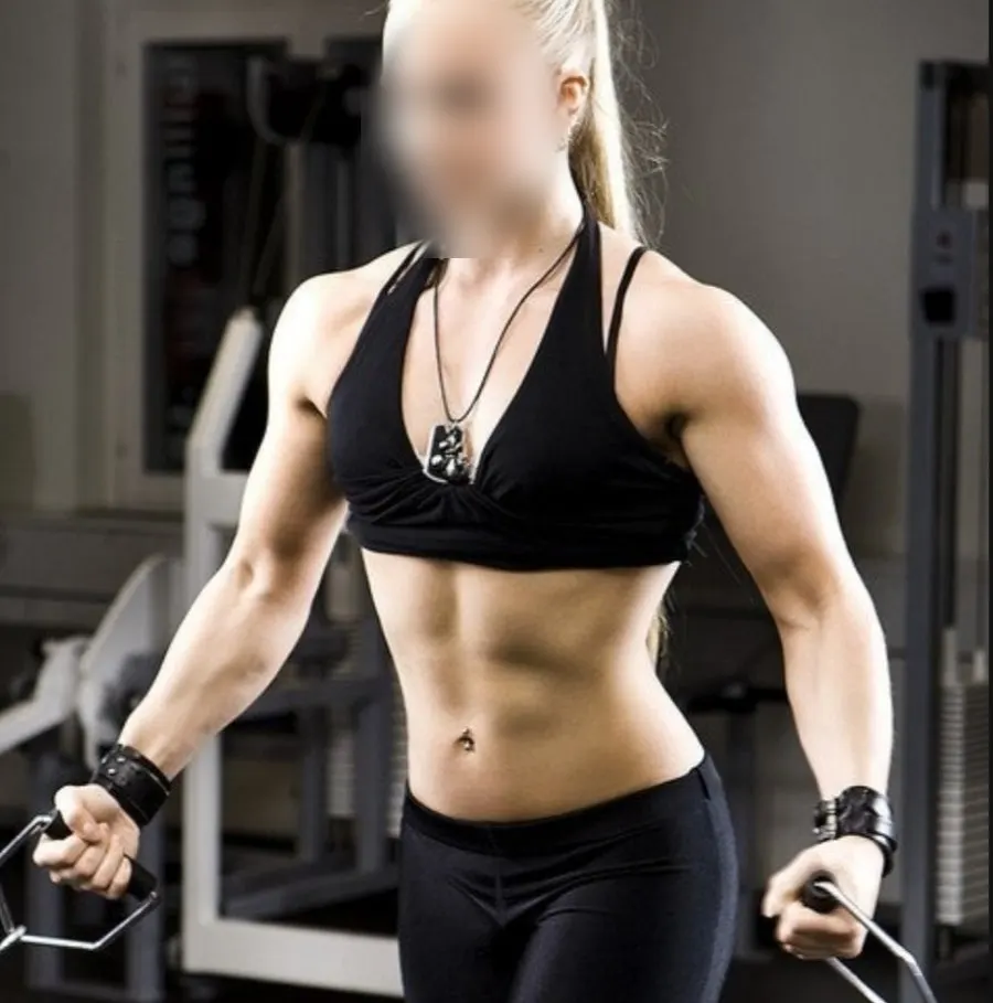 The female trainer's toned, muscular physique