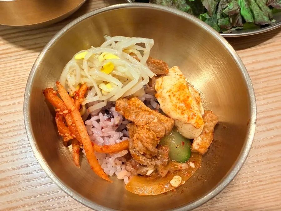A glass of soju ordered alongside the jjaglie stew