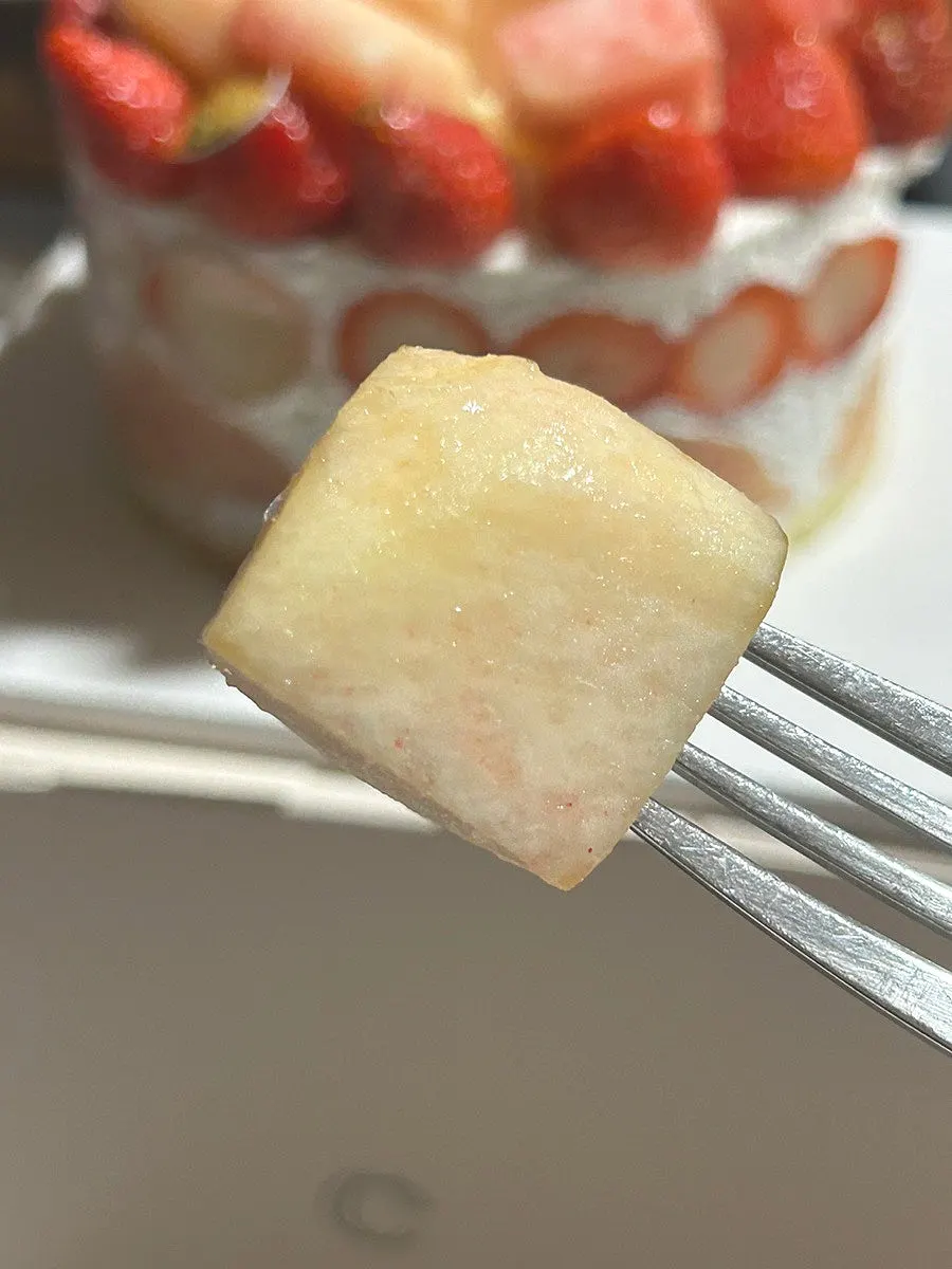 Cut section of Peach Berry Cake