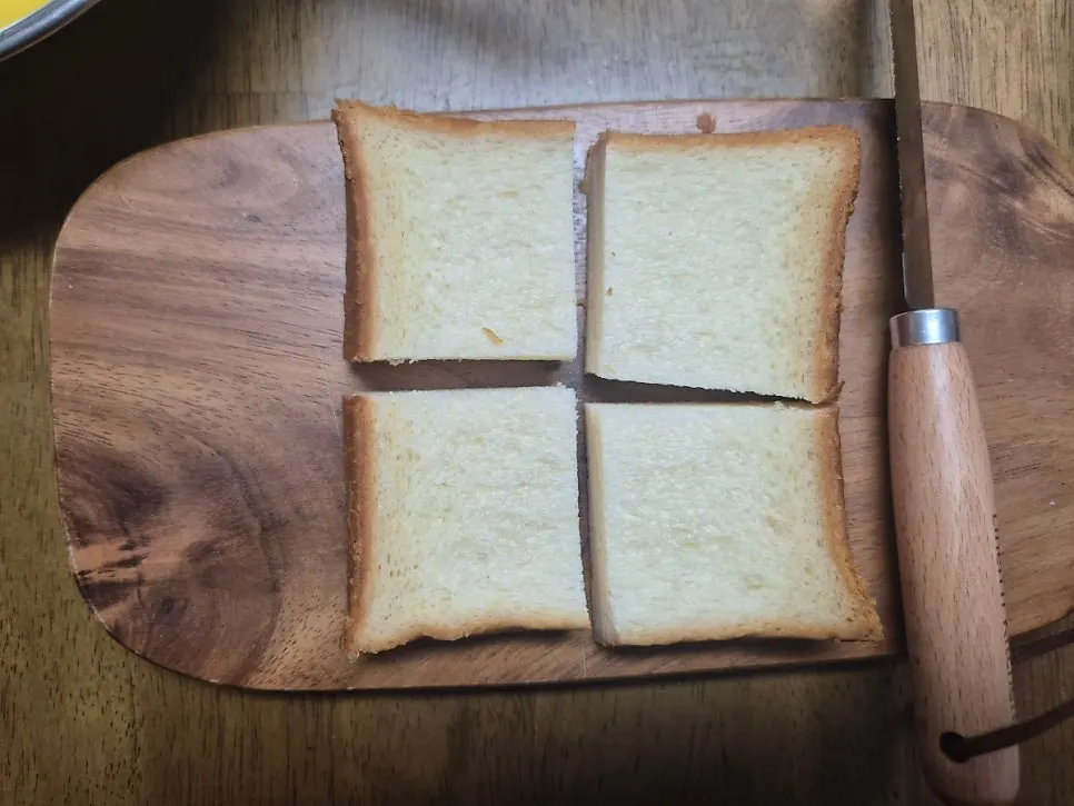 Milk bread cut into quarters for French toast