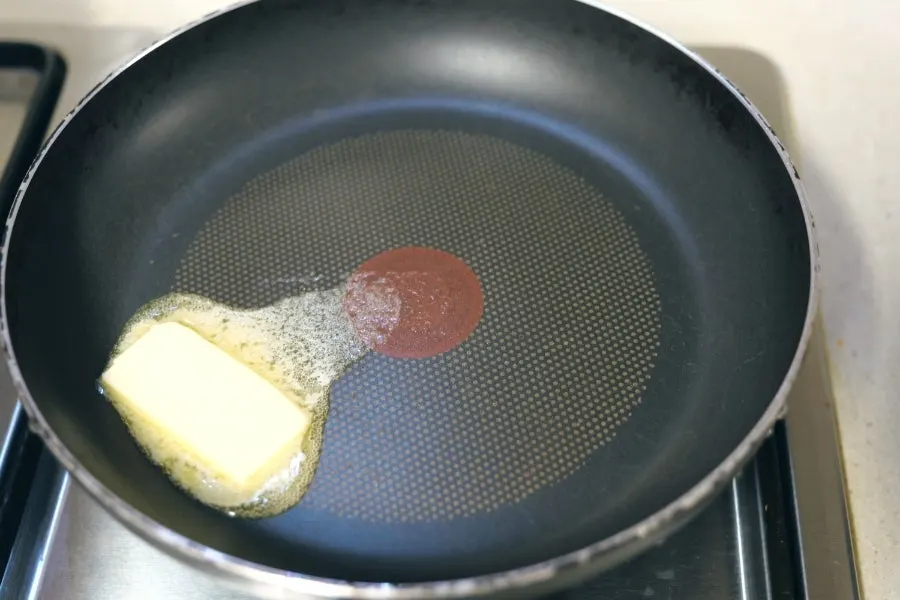 Milk bread slice coated in egg wash