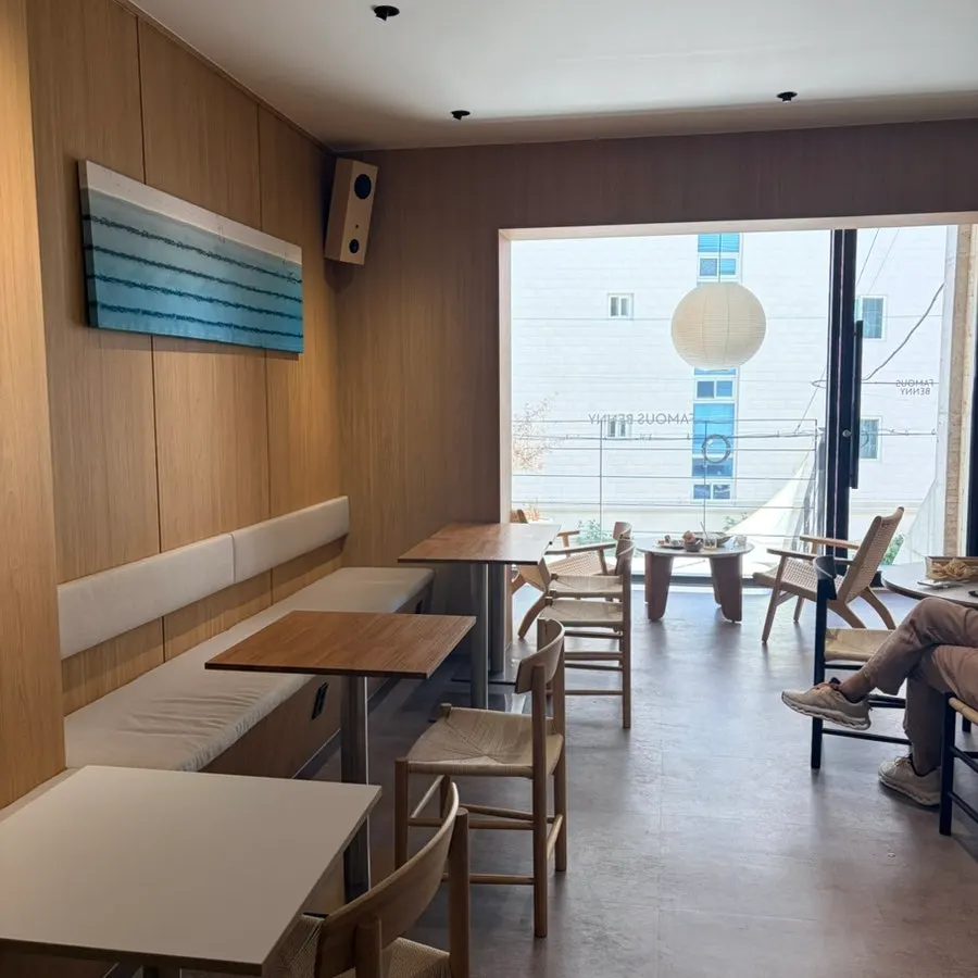 Wood-toned interior on the 2nd floor of Famous Benny Gwangalli Branch
