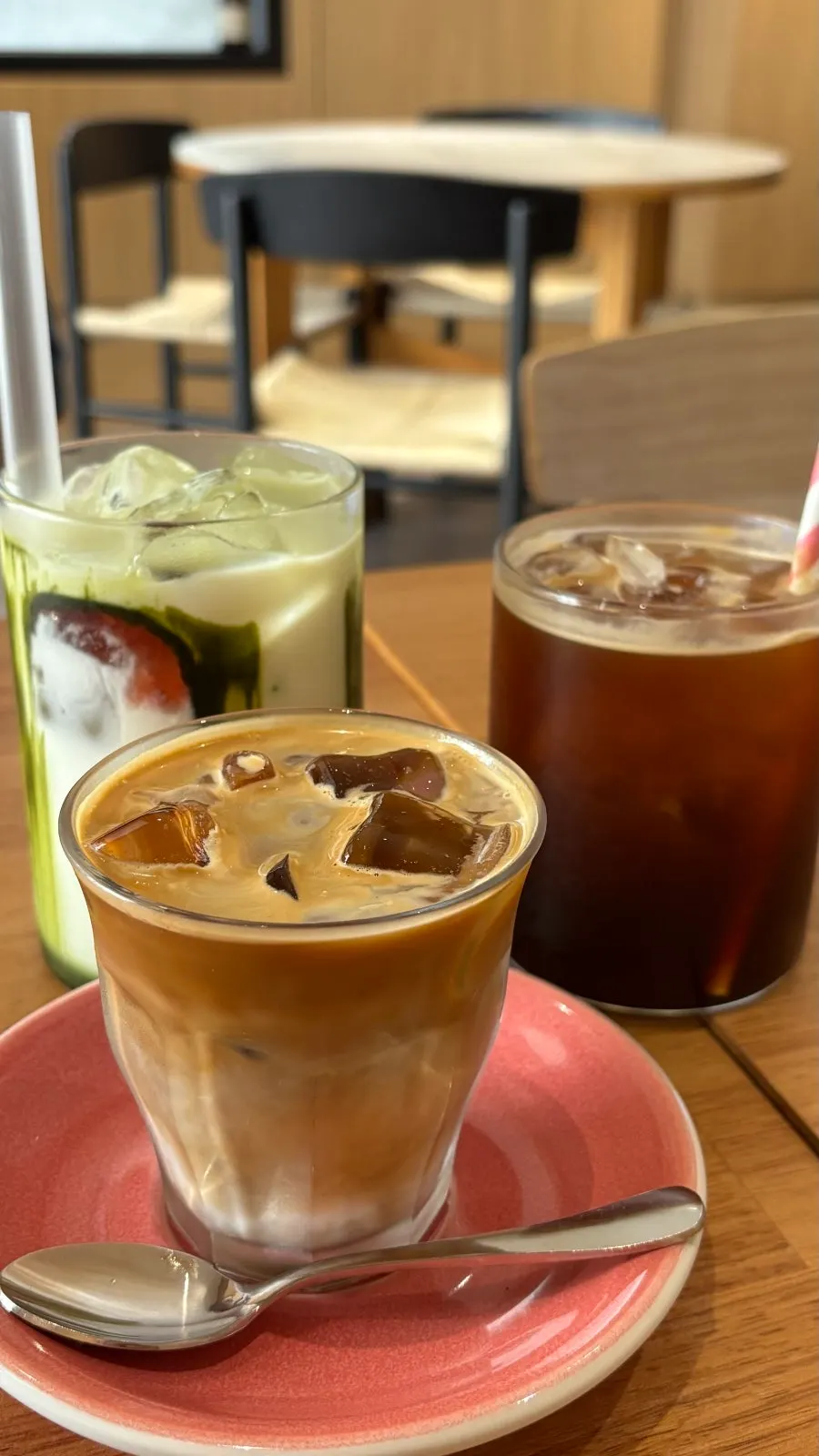 Iced Americano, flat white, and strawberry malt latte