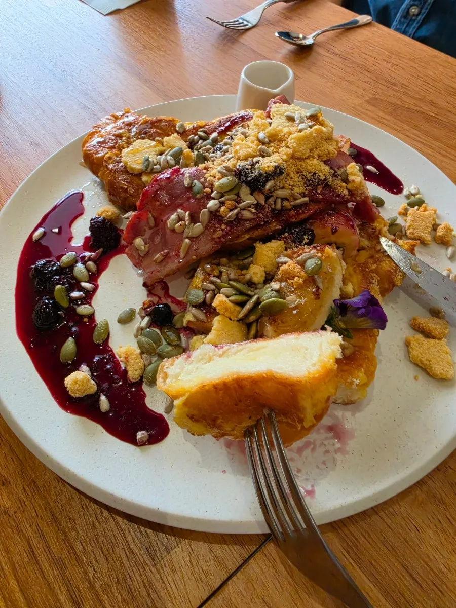 French toast generously drizzled with syrup