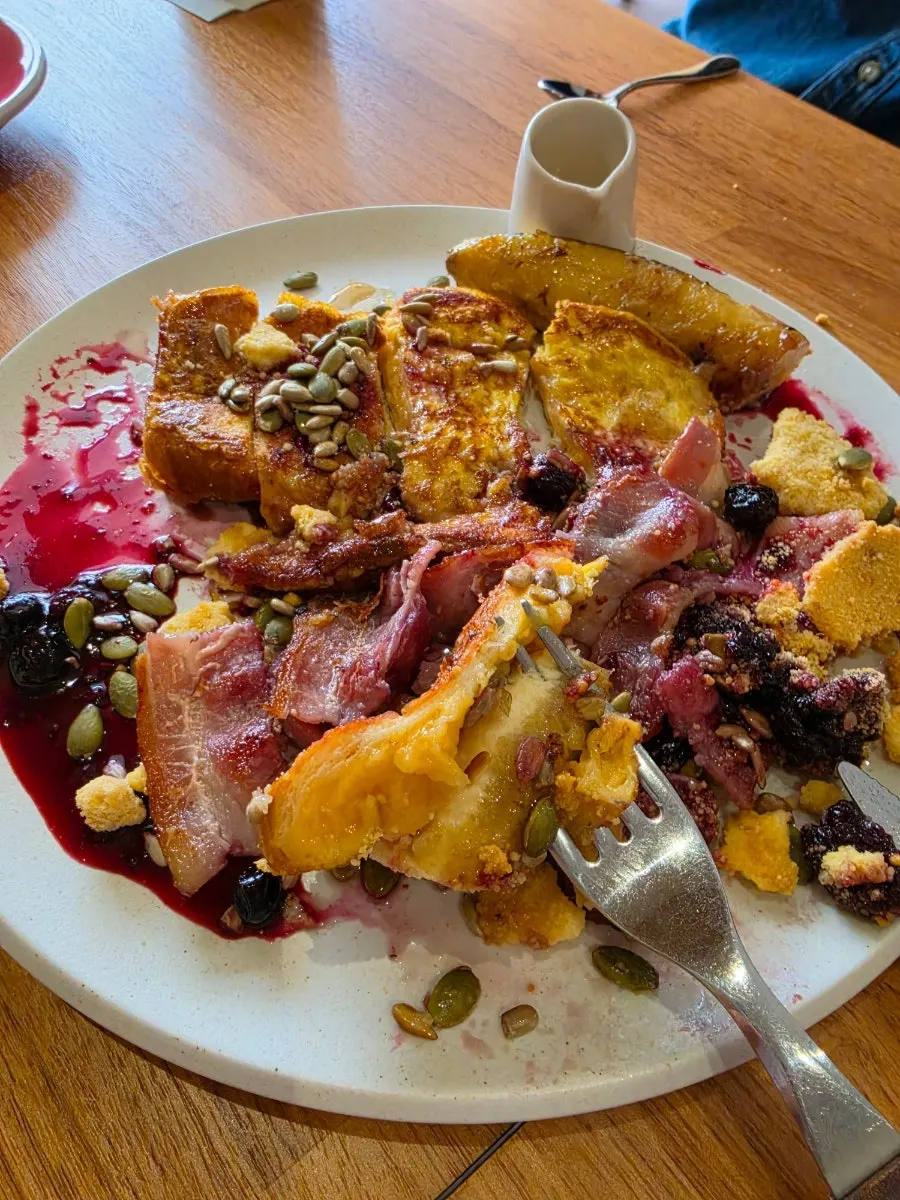 French toast plated with edible flowers